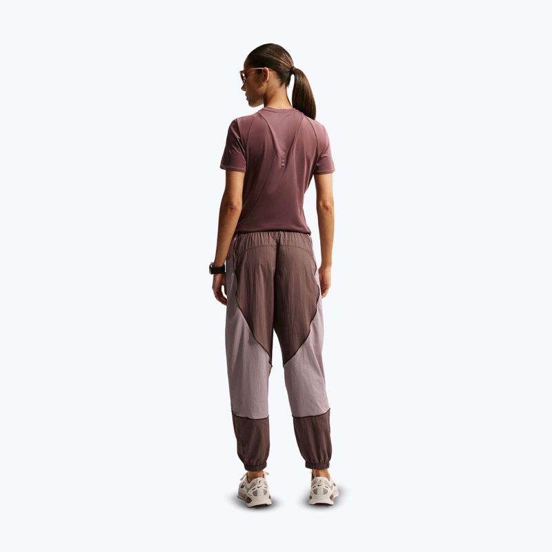 Штани для бігу жіночі Nike Swift UV Repel Mid-Rise tattoo/light violet ore 3
